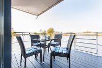 Bootsmann Lodge - Hausboot-Terrasse
