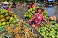 Thurgau Travel - Asienreisen - Vietnamesin auf dem Mekong-Markt